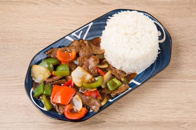 LS. Pepper Steak Over Rice.